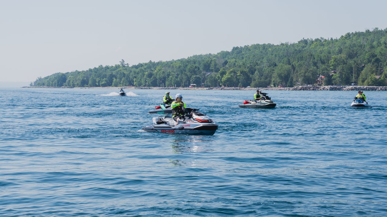 Sea-Doos riding open water on Georgian Bay